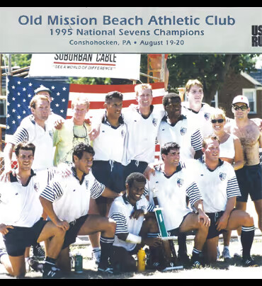 The OMBAC squad beneath a banner reading Old Mission Beach Athletic Club, 1995 National Sevens Champions